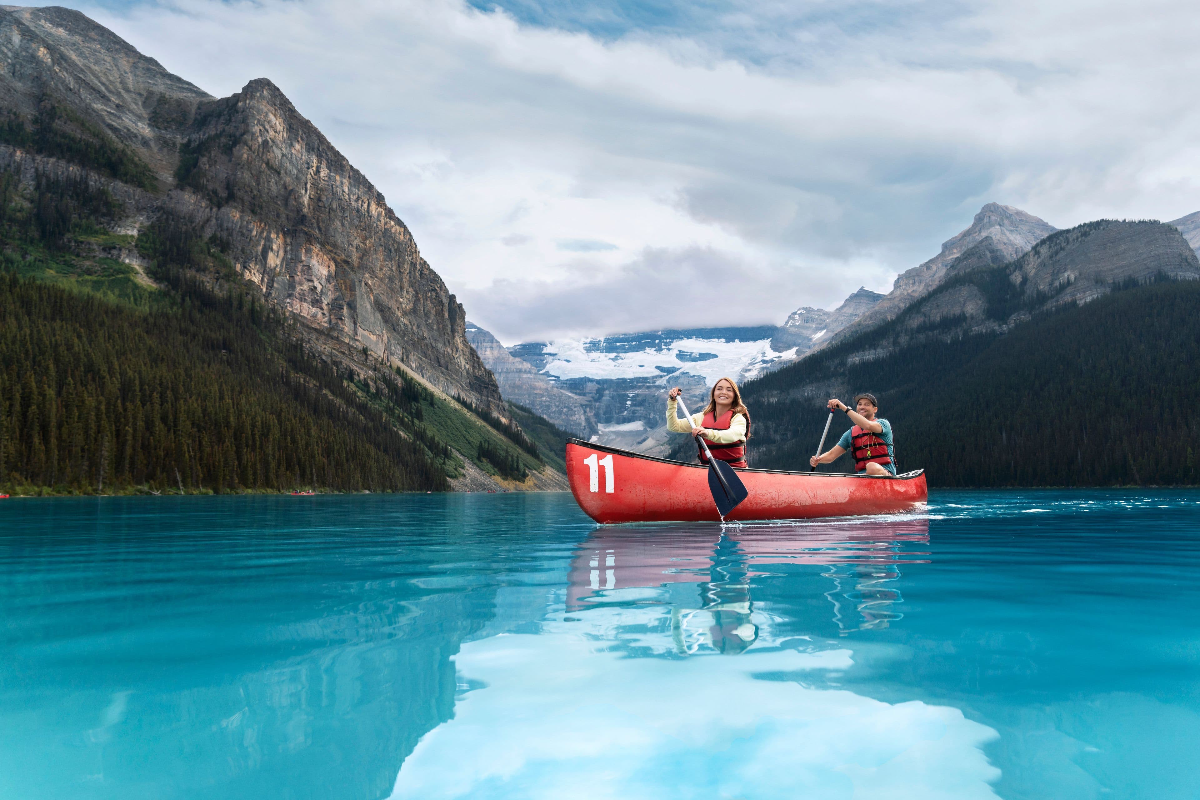 Couple canoeing on Lake Louise in Banff National Park