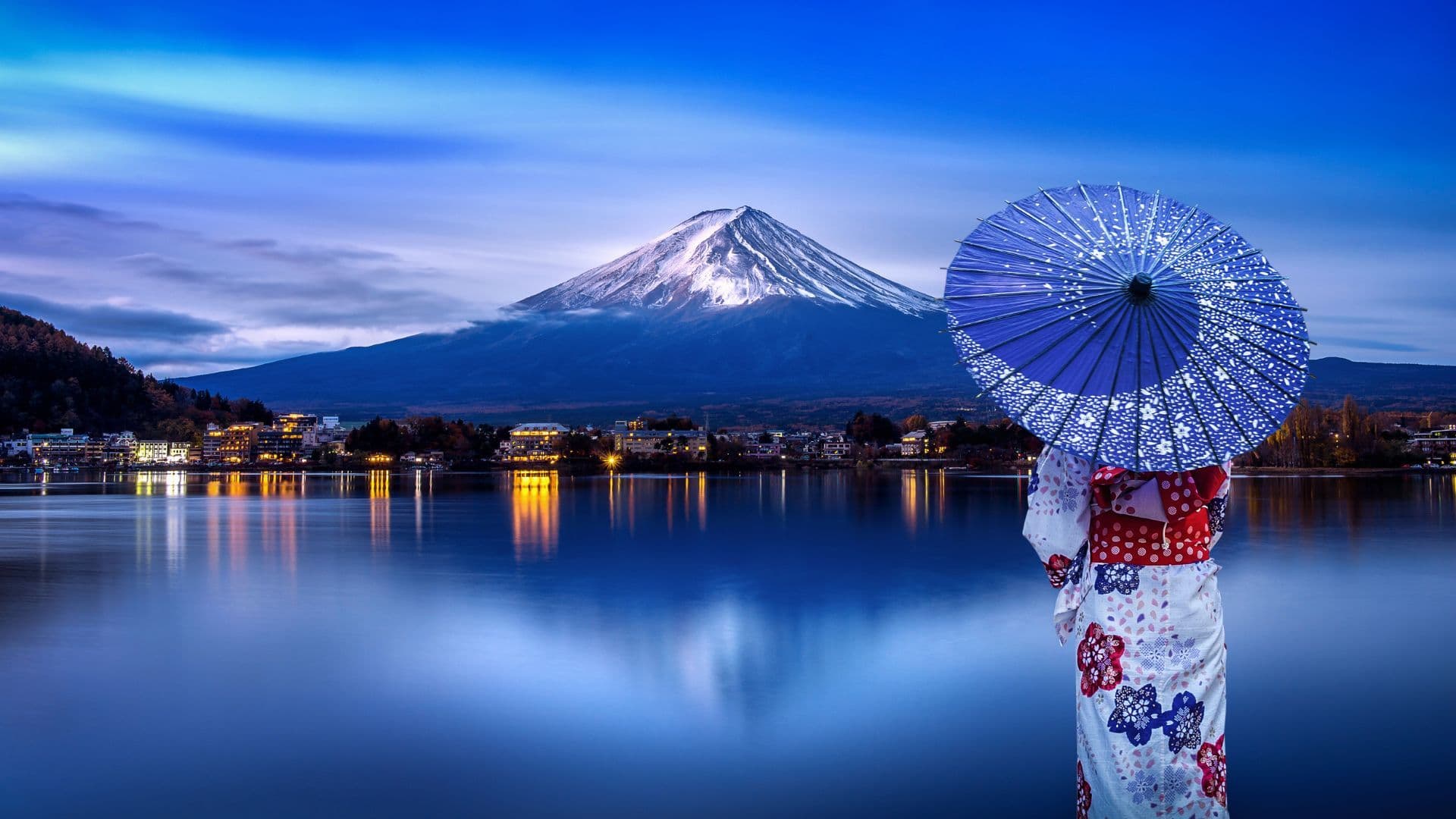 Asian woman wearing Japanese traditional kimono at Fuji mountain, Kawaguchiko lake in Japan.