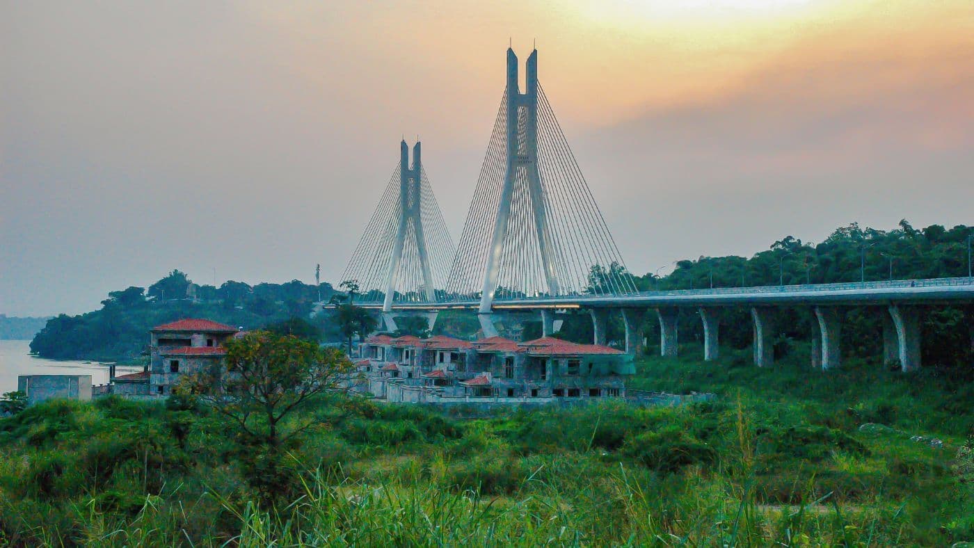 Bridge of Corniche in haze at sunset in Brazzaville.